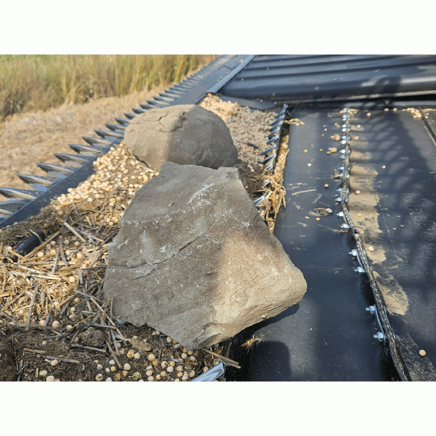 Flex Draper Rock Dam Pro fits MacDon